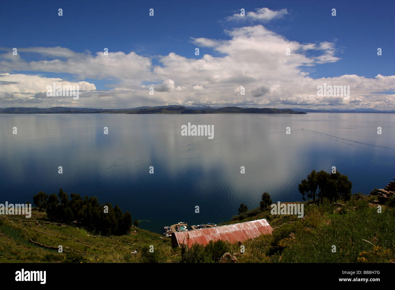 Reflections Across Lake Titicaca Peru From Amantani Island Stock Photo Alamy