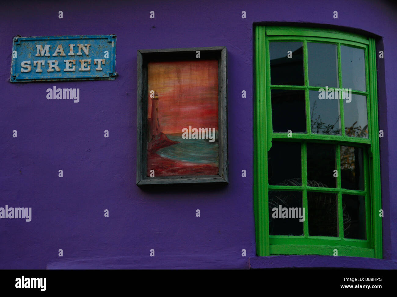 Colorful street sign, green window, painting, Kinsale, Cork, Ireland Stock Photo