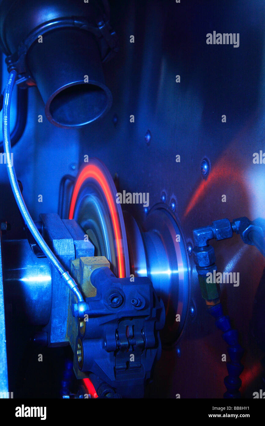 Glowing brake disc during a brake test hires stock photography and