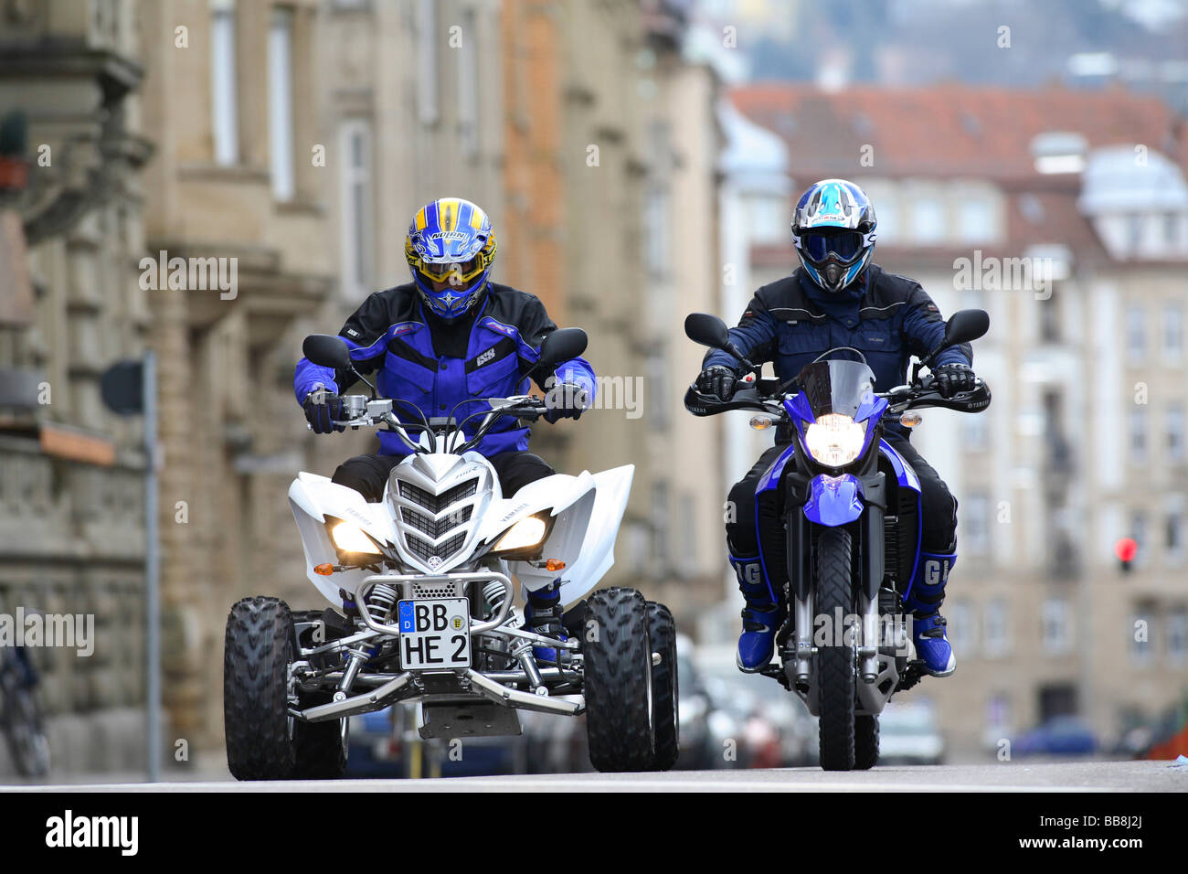 Quad and motorcycle, riding shot Stock Photo