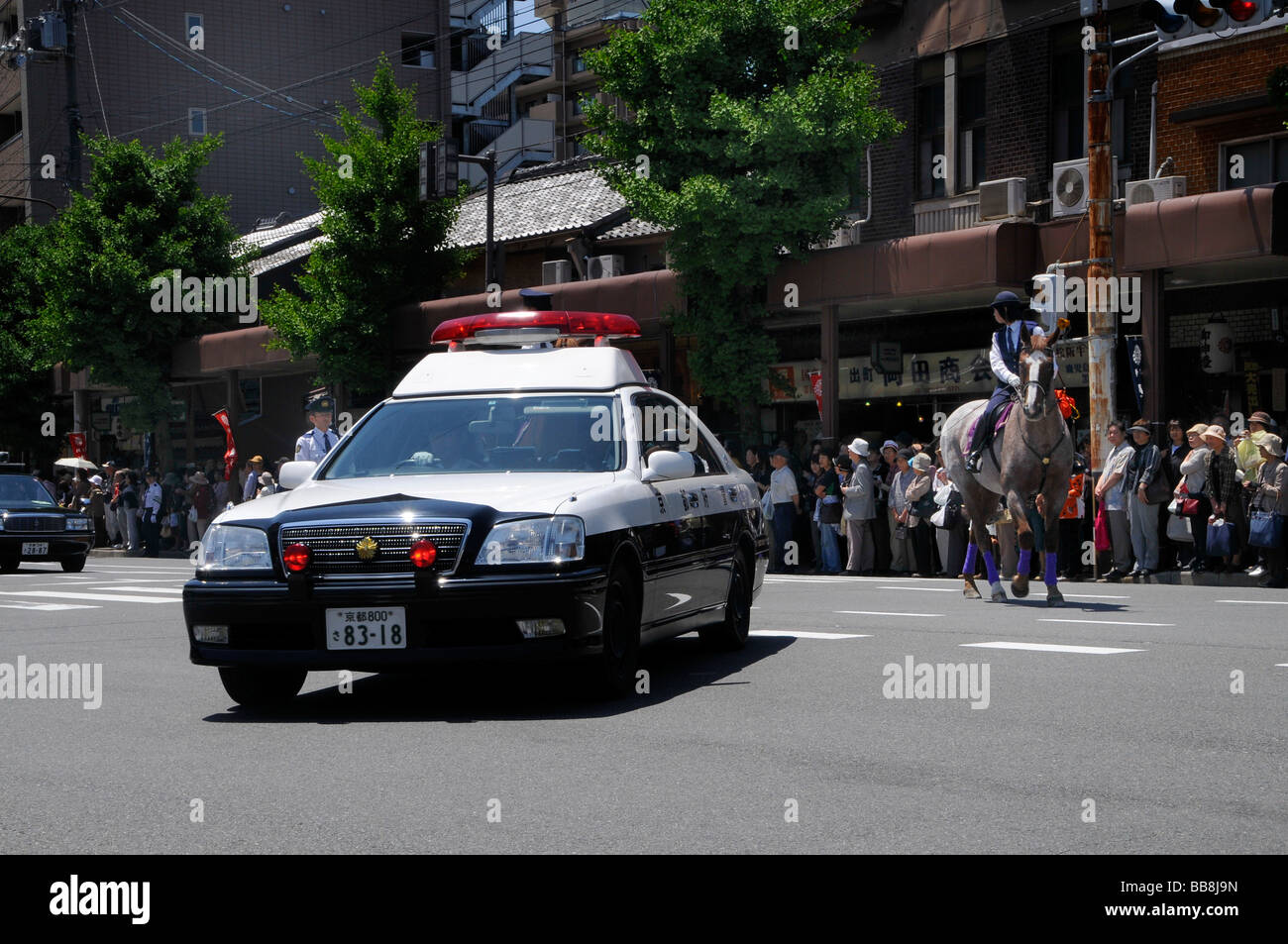 Japanese police on duty with police car and mounted police, Kyoto, Japan Stock Photo