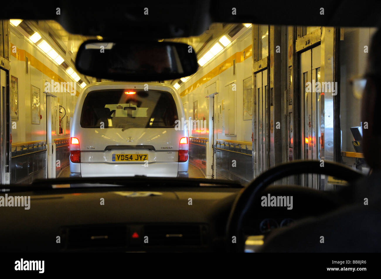 Driving on to the Eurotunnel Train, Folkestone, Kent, England, UK (editorial only). Stock Photo