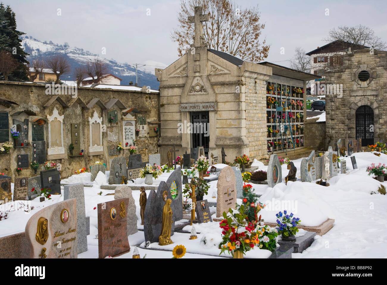 Graves and vaults, winter, Pigra cemetery, Lake Como, Lombardy, Italy, Europe Stock Photo