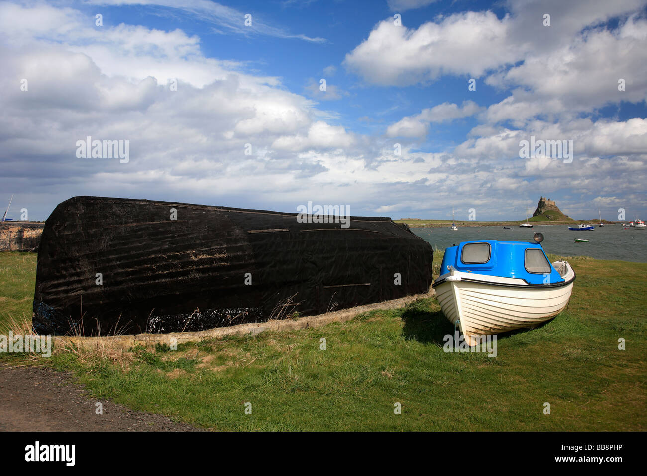 Upturned Herring Fishing Boat in the Harbour with Lindisfarne Castle