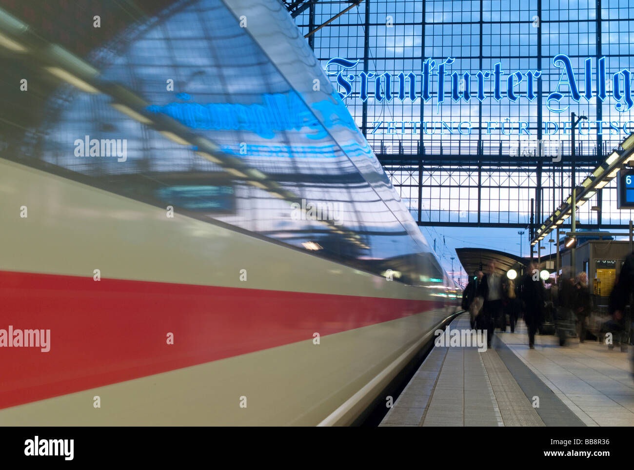 One of the German Federal Railways ICE leaves the Central Station, passengers along side the train, Frankfurt Hauptbahnhof, Fra Stock Photo