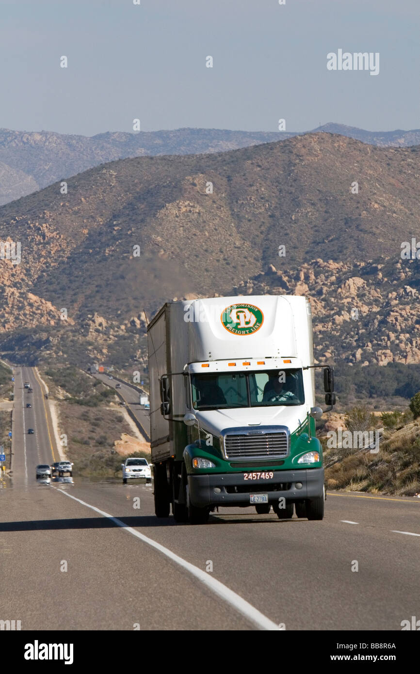 Long haul truck traveling on Interstate 8 between El Centro and San Diego Southern California USA Stock Photo