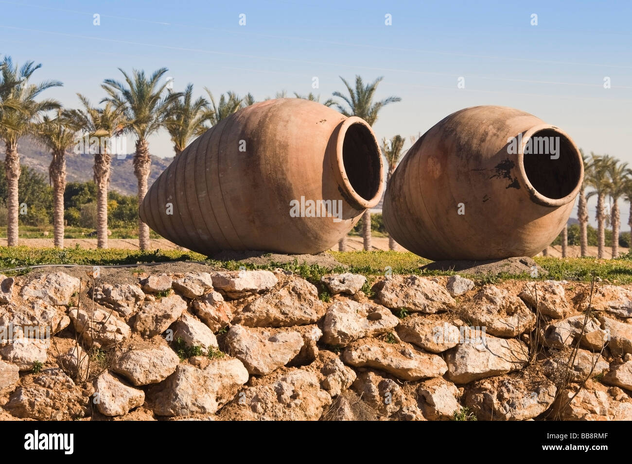 Two huge urns decorating a garden; Coin, Malaga Province, Spain Stock Photo