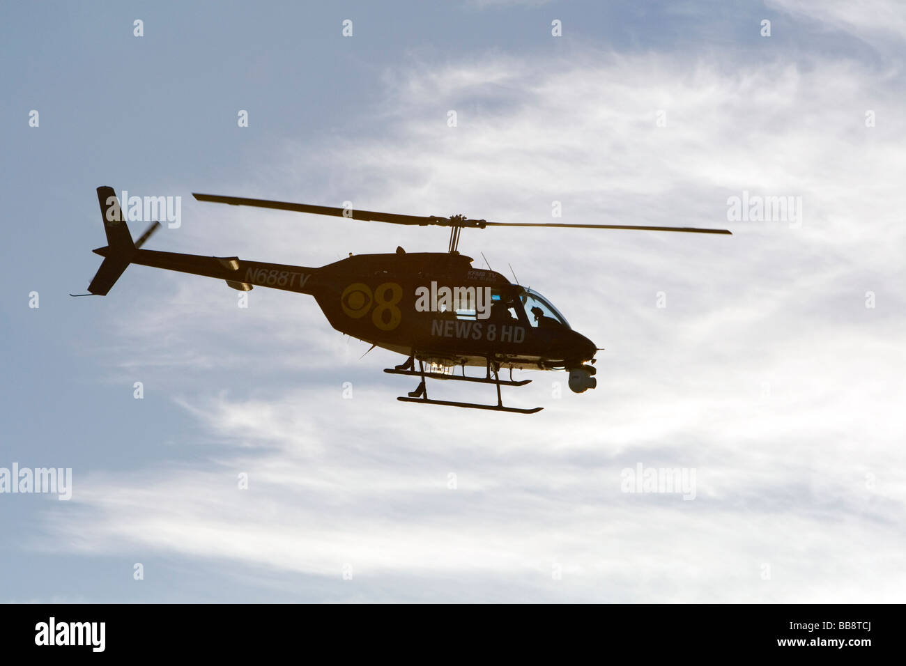 News helicopter flying over Mission Beach in San Diego Southern California USA Stock Photo