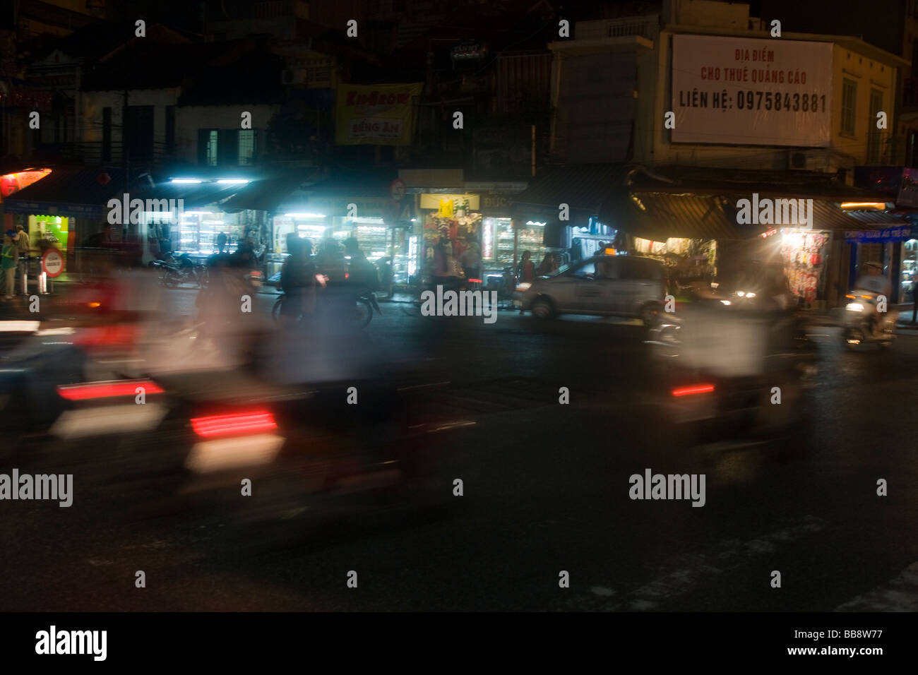 Hanoi in Vietnam late at night with heavy traffic Stock Photo