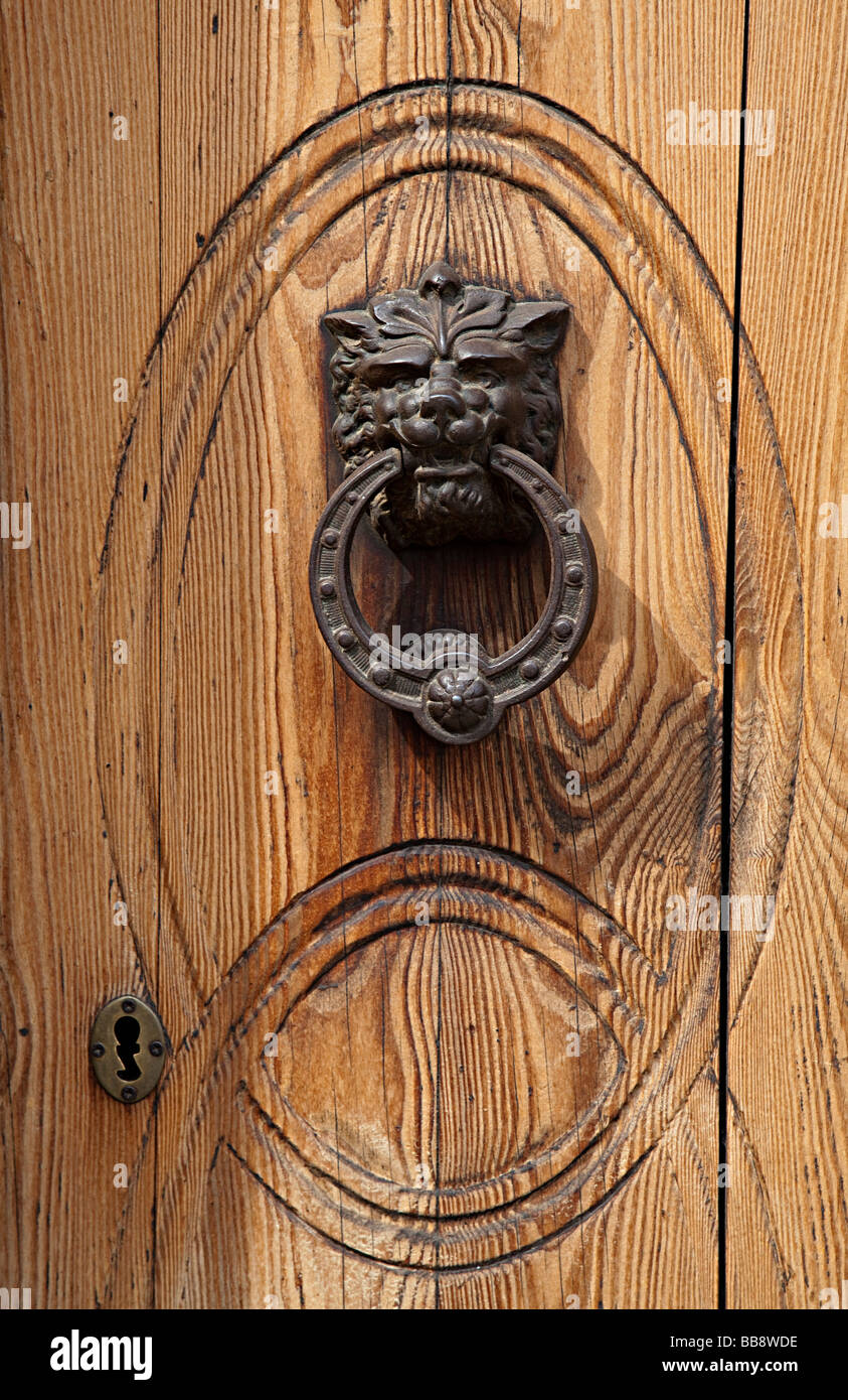 Metal door knocker in shape of lion head Arta Mallorca Spain Stock Photo
