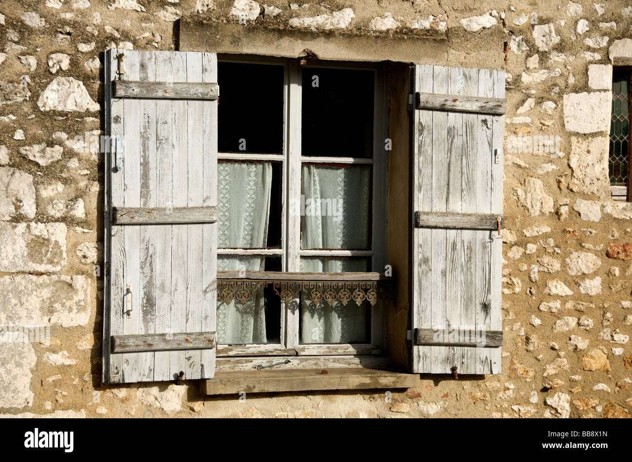 Unrestored wooden shutters and window Rue de Jouy Upper Provins Seine et Marne France Stock Photo