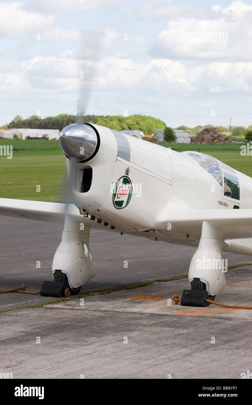 Percival Mew Gull G-AEXF parked at Breighton Airfield with engine running Stock Photo