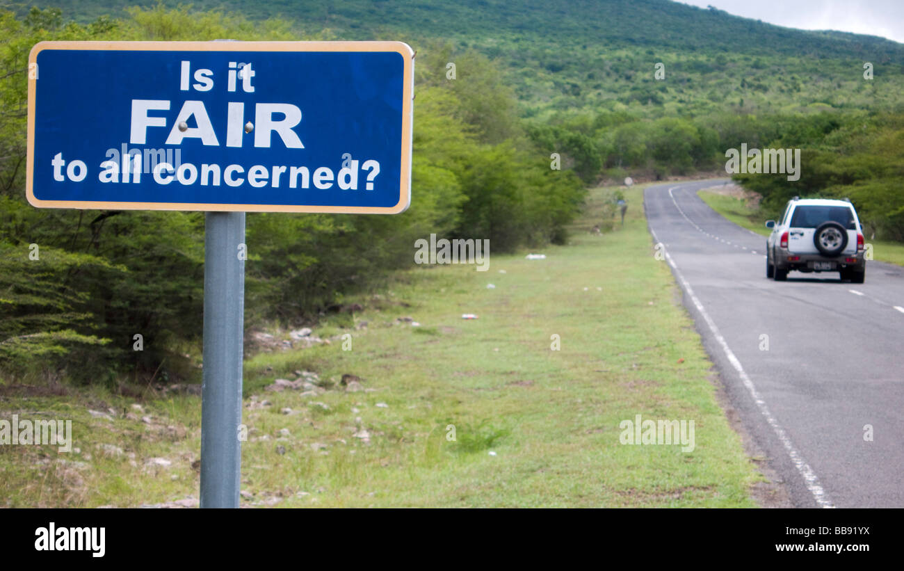 Epithets sayings and advice are posted as road signs on Nevis in the Caribbean Stock Photo