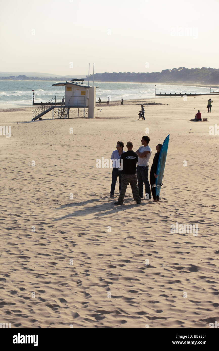 Surfers on Bournemouth Beach, Portrait Stock Photo