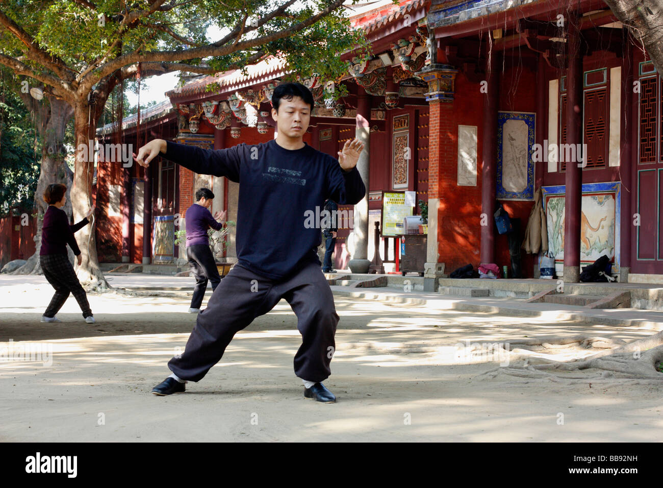 A young man practices martial arts at Confucian Temple. Tainan, Taiwan Stock Photo