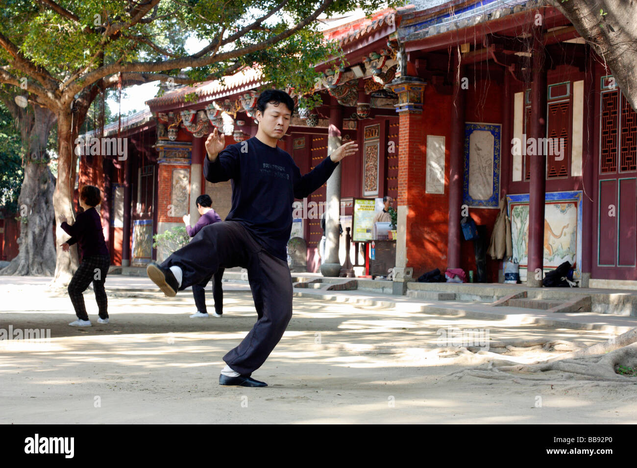 A young man practices martial arts at Confucian Temple. Tainan, Taiwan Stock Photo