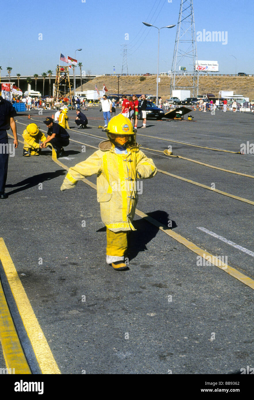 Firefighter demo turnout protective suit wear safe race show fair Stock Photo: 24171674 - Alamy