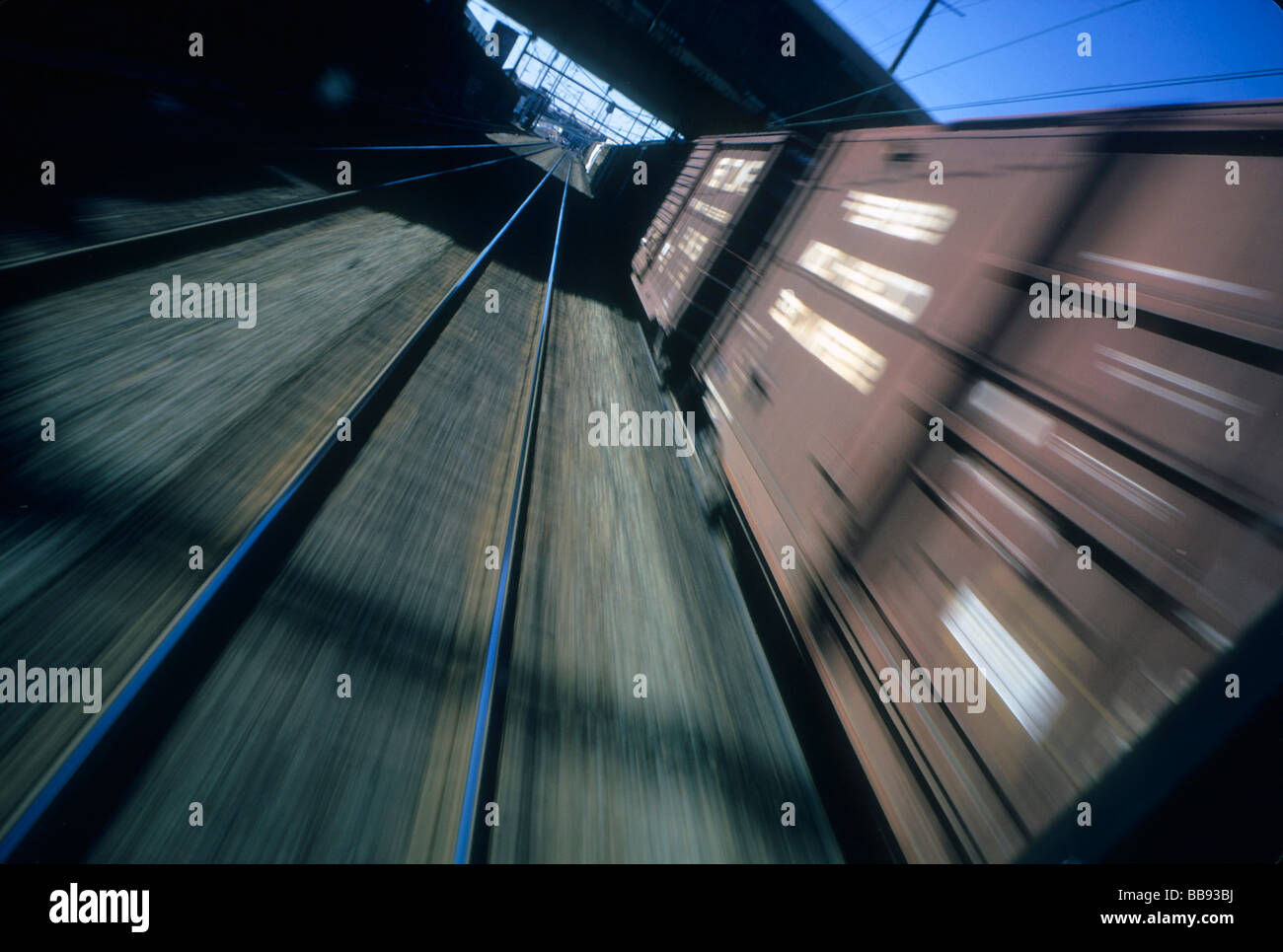 train rail freight transport ship boxcar speed blur fast Stock Photo
