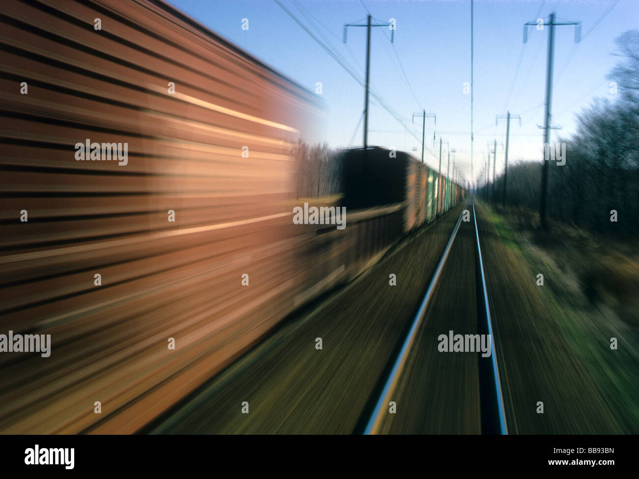 train rail freight transport ship boxcar speed blur fast Stock Photo