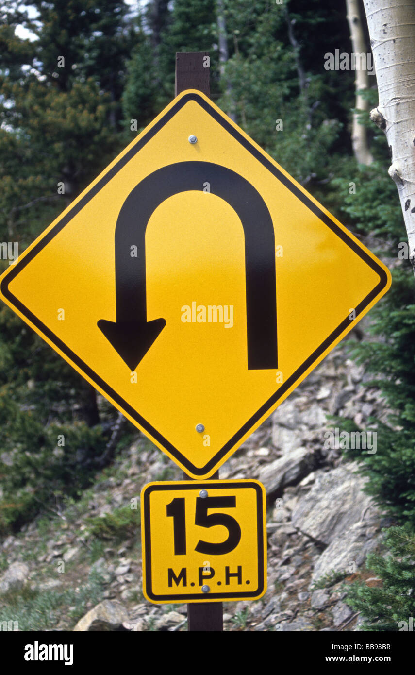 https://c8.alamy.com/comp/BB93BR/sign-warn-u-turn-sharp-curve-speed-limit-danger-risk-alert-highway-BB93BR.jpg