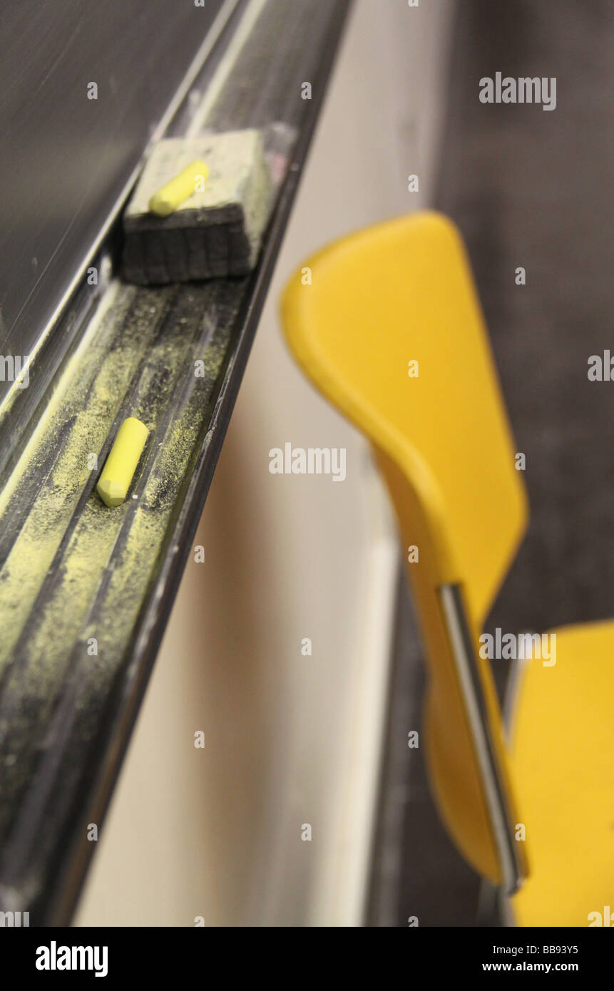 Blackboard, chalk and chair in a classroom Stock Photo Alamy