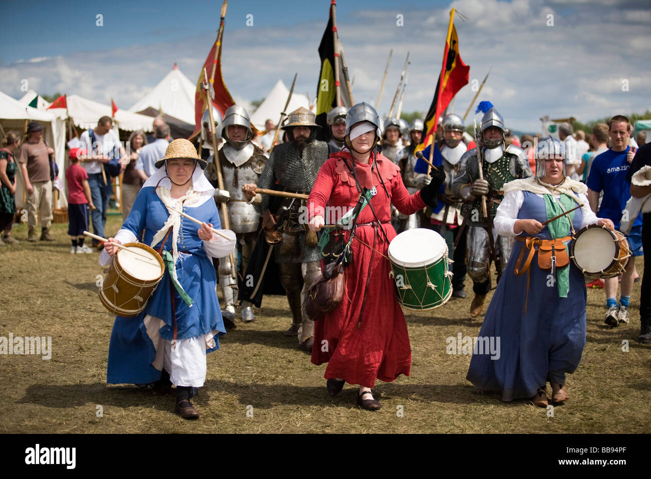 Female drummers lead a column of knights at Tewkesbury Medieval Festival 2008, Gloucestershire, UK Stock Photo