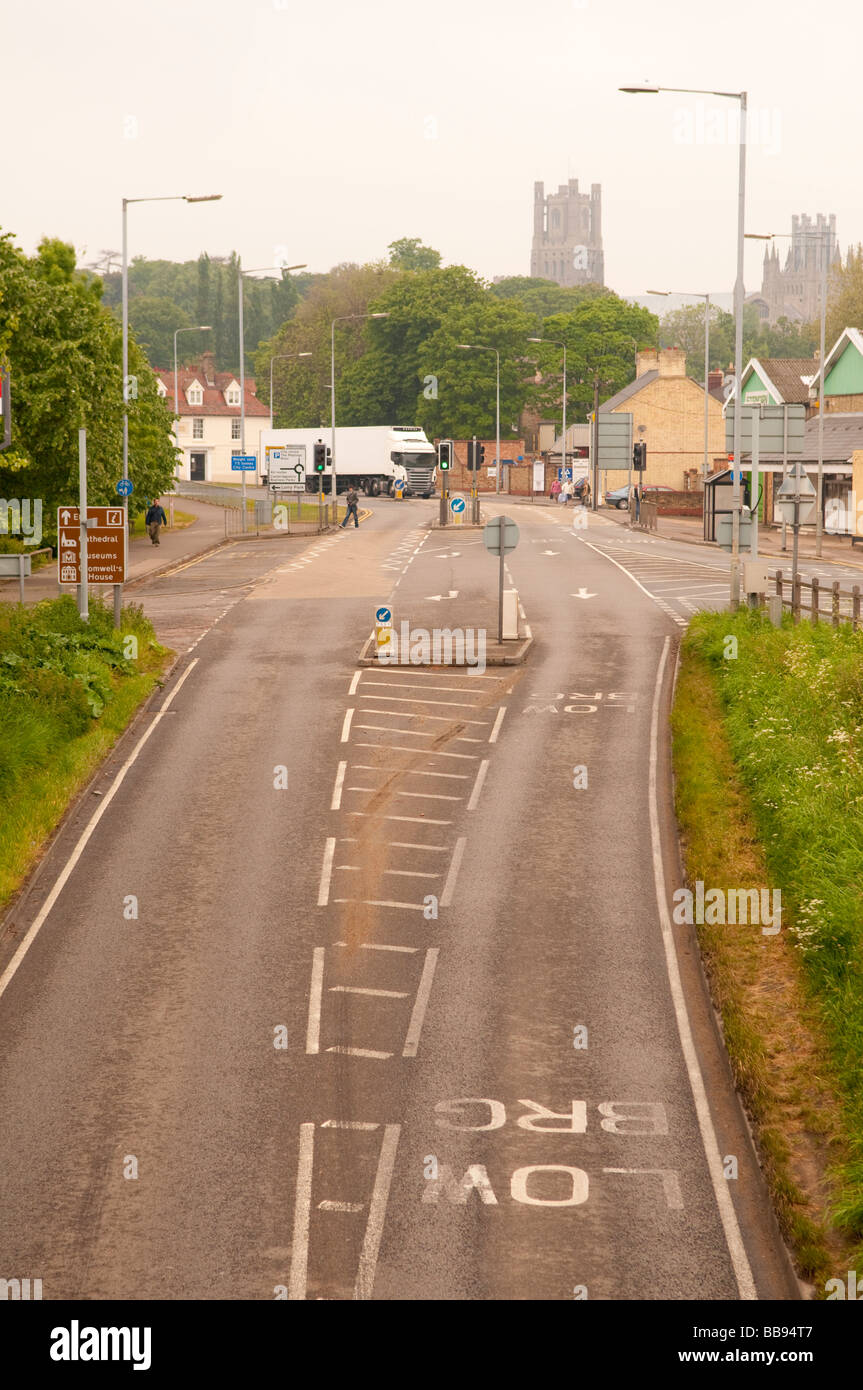 Quiet empty road with Ely Cathedral in the background Stock Photo