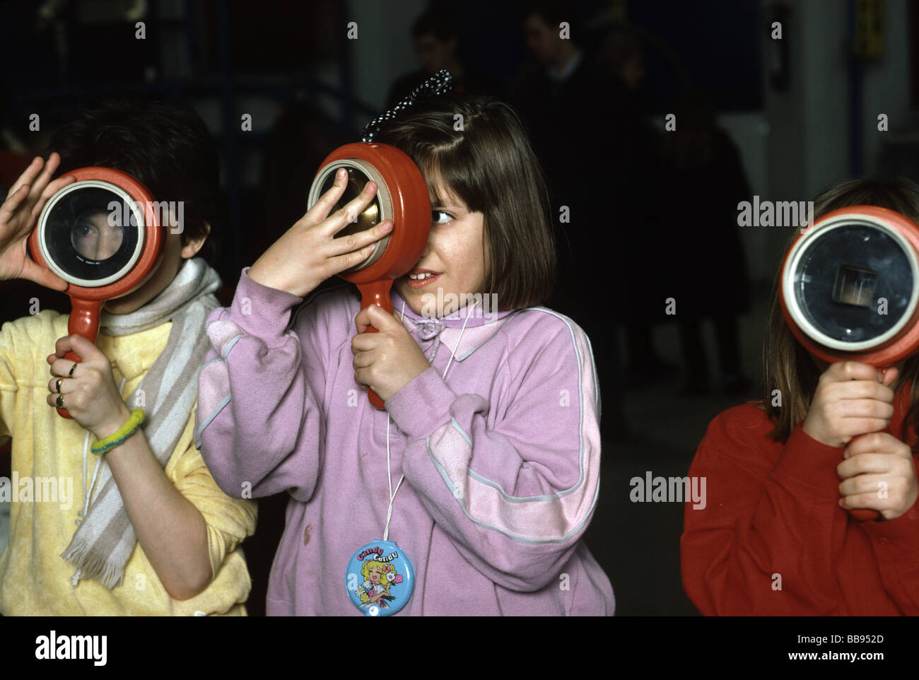 Children at the Science Museum playing with lenses Stock Photo