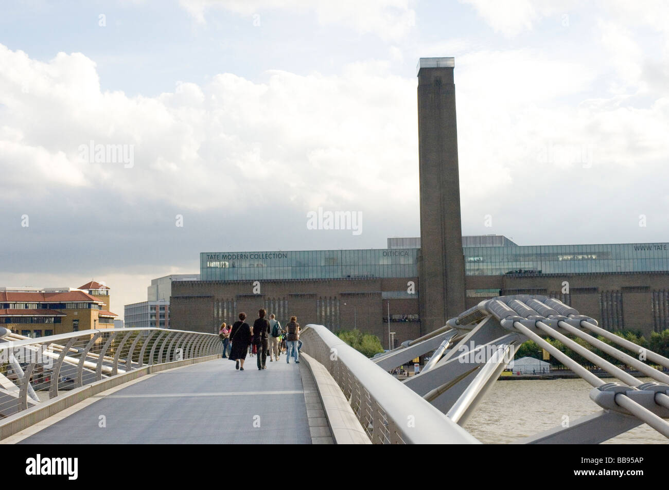 millenium footbridge over the river thames in london with the tatemodern art gallery in the background Stock Photo