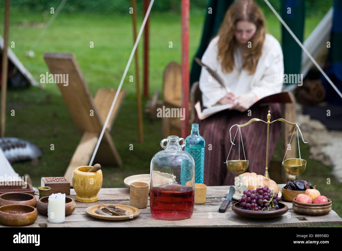 A reenactor dressed as a  medieval herbalist, Tewkesbury Medieval Festival 2008, Gloucestershire, UK Stock Photo