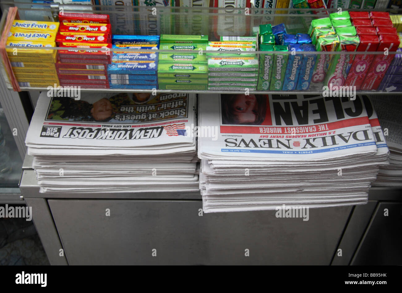 The Daily News and the New York Post newspapers on sale at a New York news stand. Stock Photo