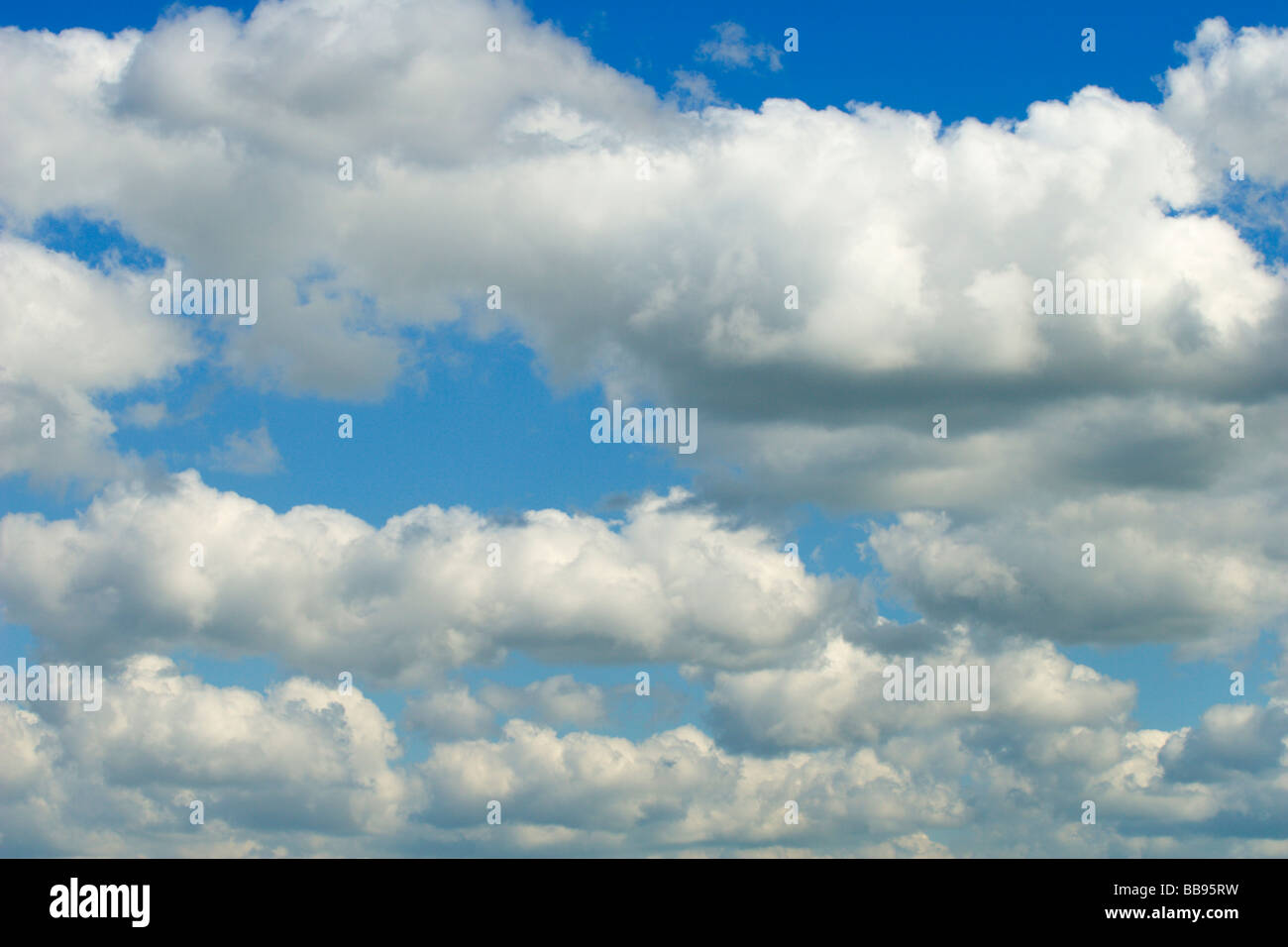 Fluffy white and grey clouds hi-res stock photography and images - Alamy