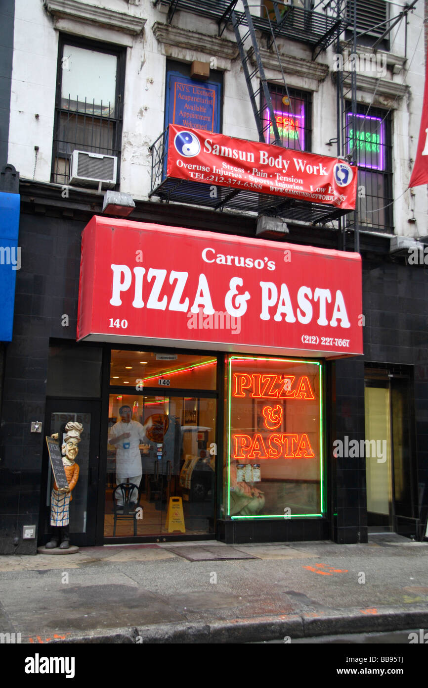 The store front to Caruso's Pizza & Pasta take away restaurant in New York Stock Photo Alamy