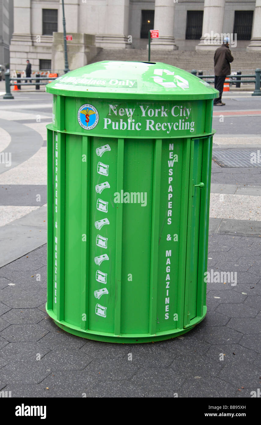 A green New York City Public Recycling bin for newspapers and magazines near City Hall, New York. Stock Photo