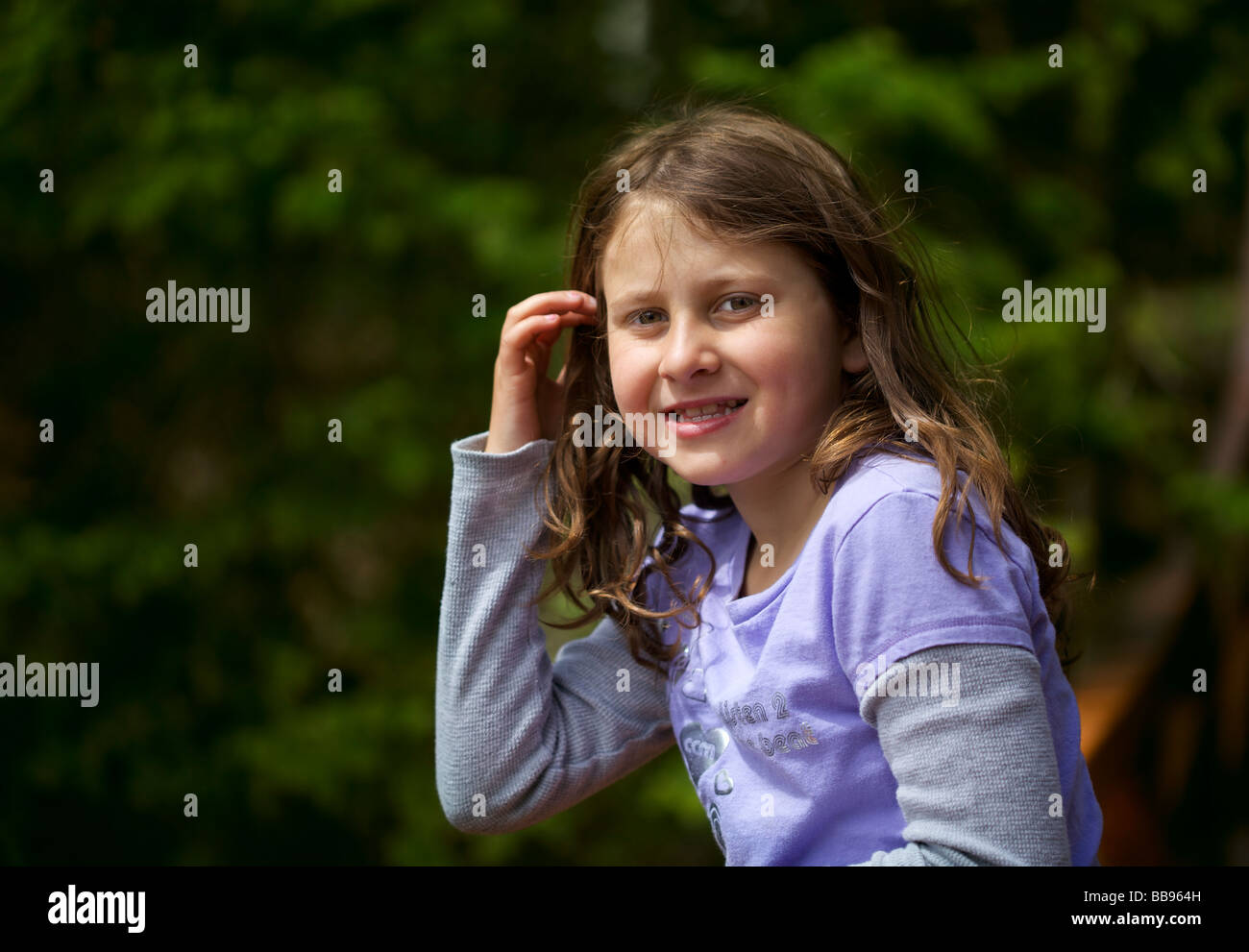 Portrait of a happy young girl at the playground Stock Photo - Alamy