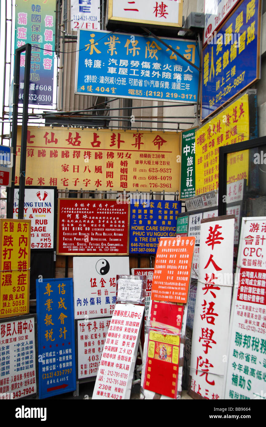 Colourful signs and advertising hoardings in Chinatown, New York. Stock Photo