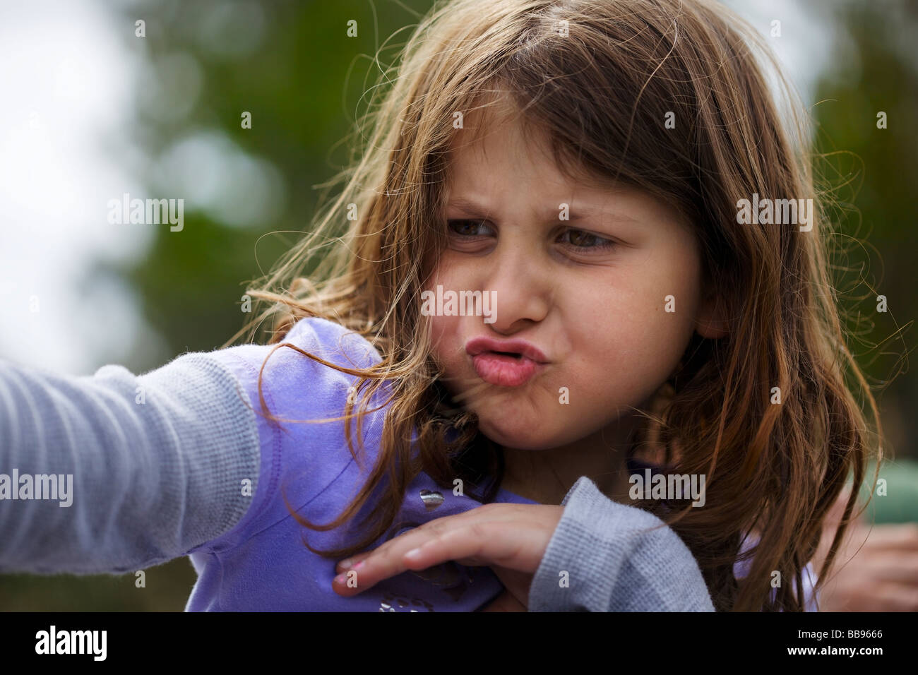 Portrait of a happy young girl at the playground Stock Photo - Alamy