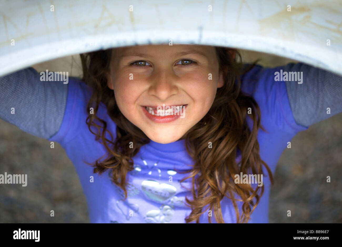 Portrait of a young girl playing at the playground Stock Photo - Alamy