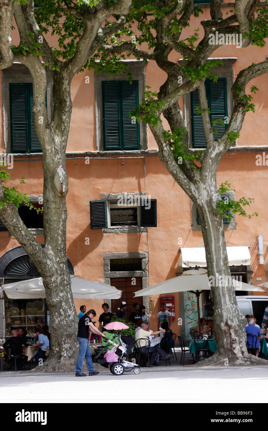 Popular restaurant and picnic piazza in the market town of LUCCA  an Etruscan town originally established by the Romans in 180BC Stock Photo