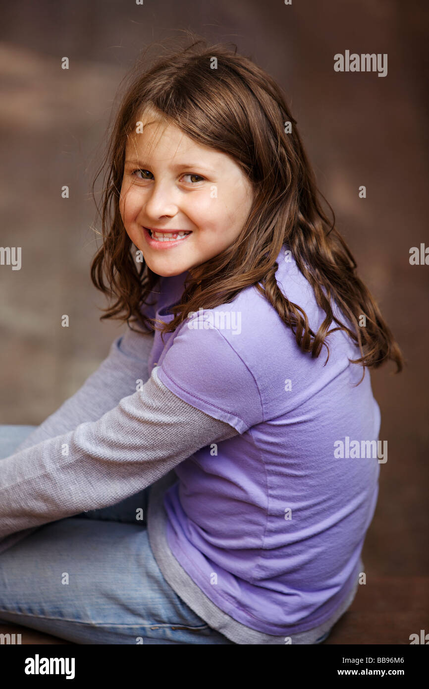 Portrait of a happy young girl at the playground Stock Photo - Alamy