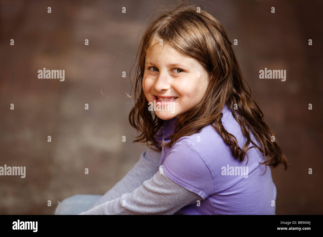 Portrait of a happy young girl at the playground Stock Photo - Alamy