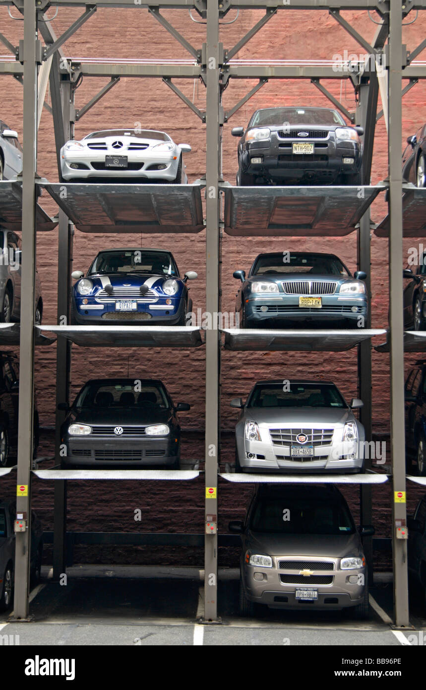 A multi level, stacked car parking system in the Soho area of New York City. Stock Photo