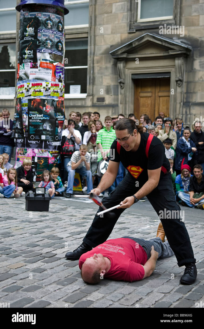Street Performer entertains audience juggling Edinburgh Fringe Festival