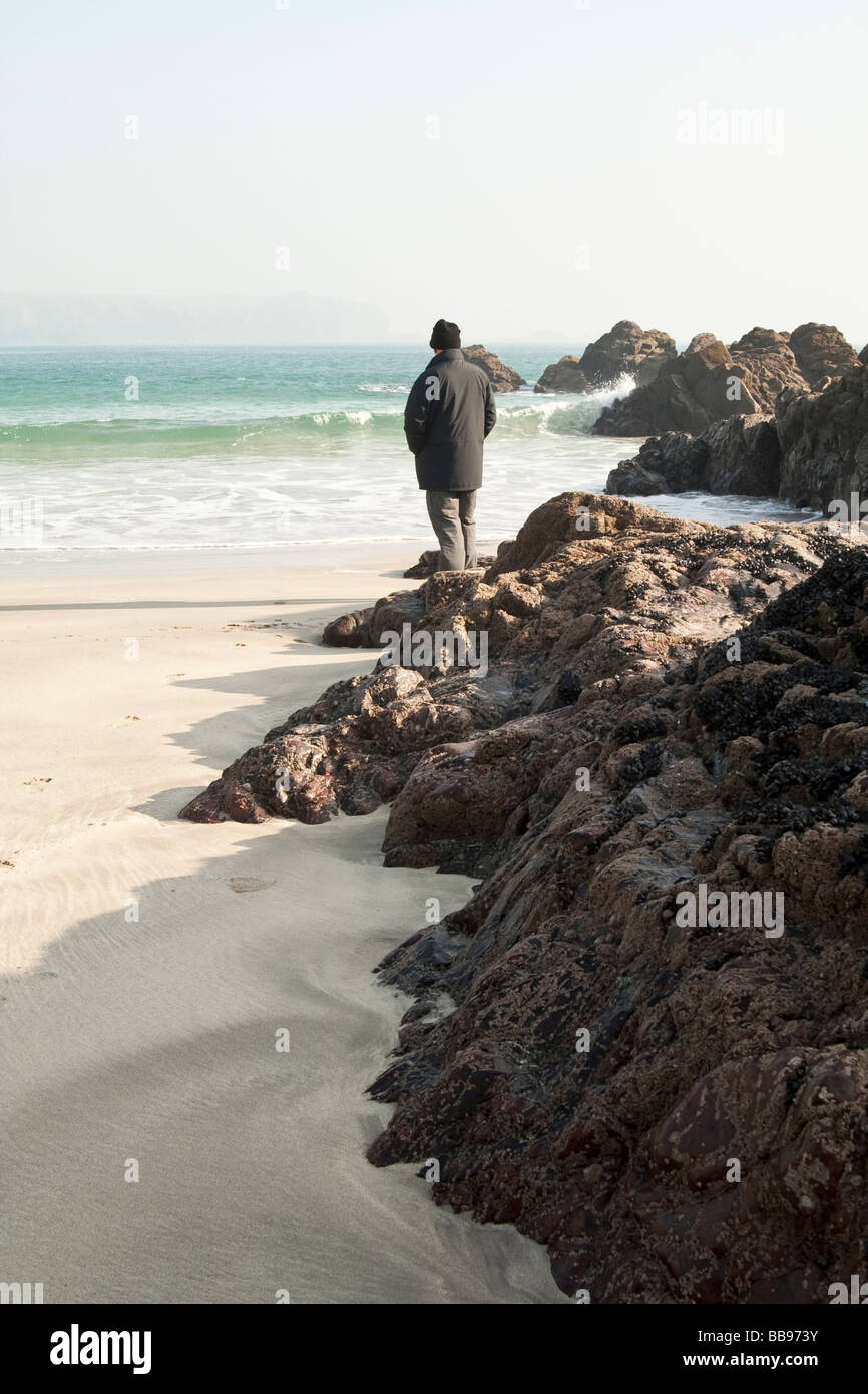A man looking out to sea Stock Photo - Alamy