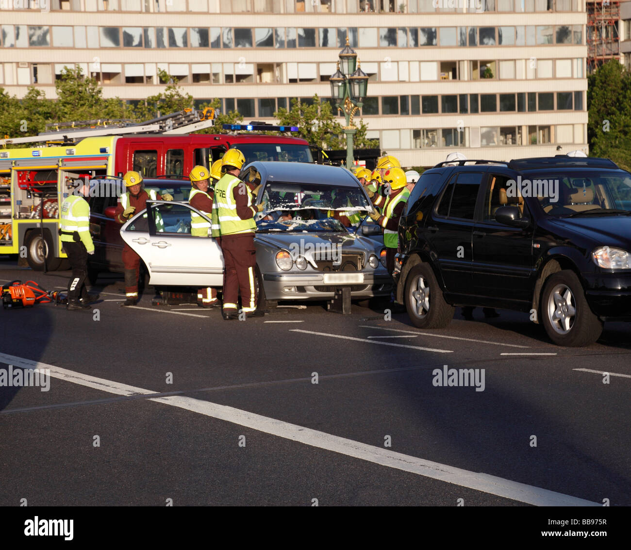 Emergency services removing the roof from a vehicle involved in an accident Westminster London England UK Stock Photo