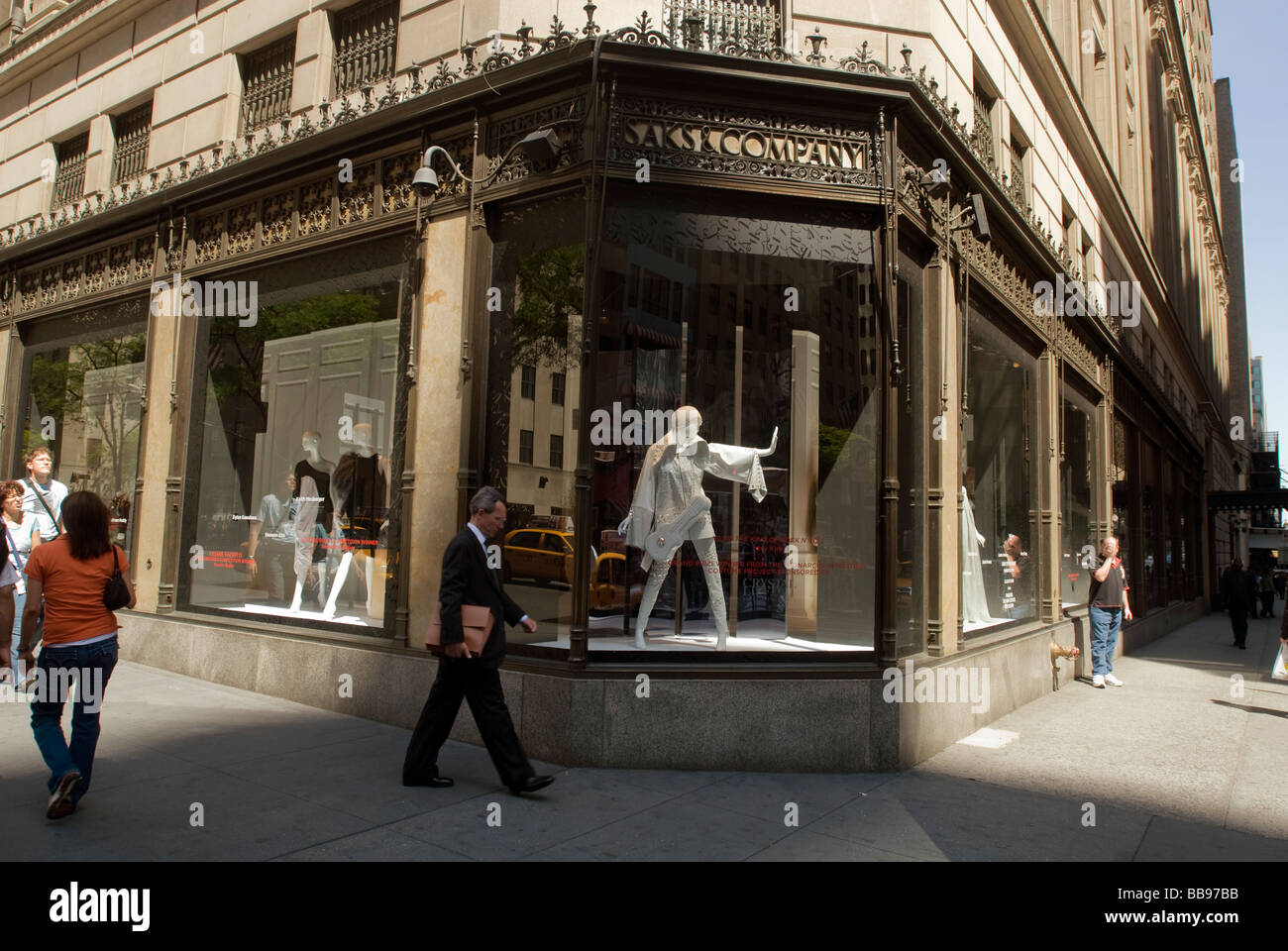 Shoppers outside of Saks Fifth Avenue in New York Stock Photo