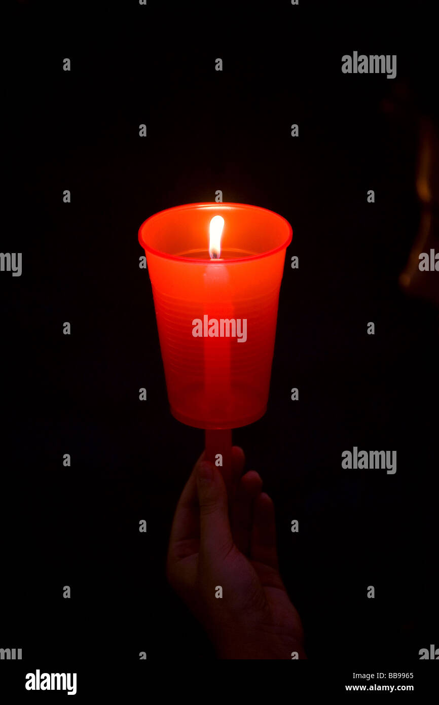 Hand holding candle Stock Photo Alamy
