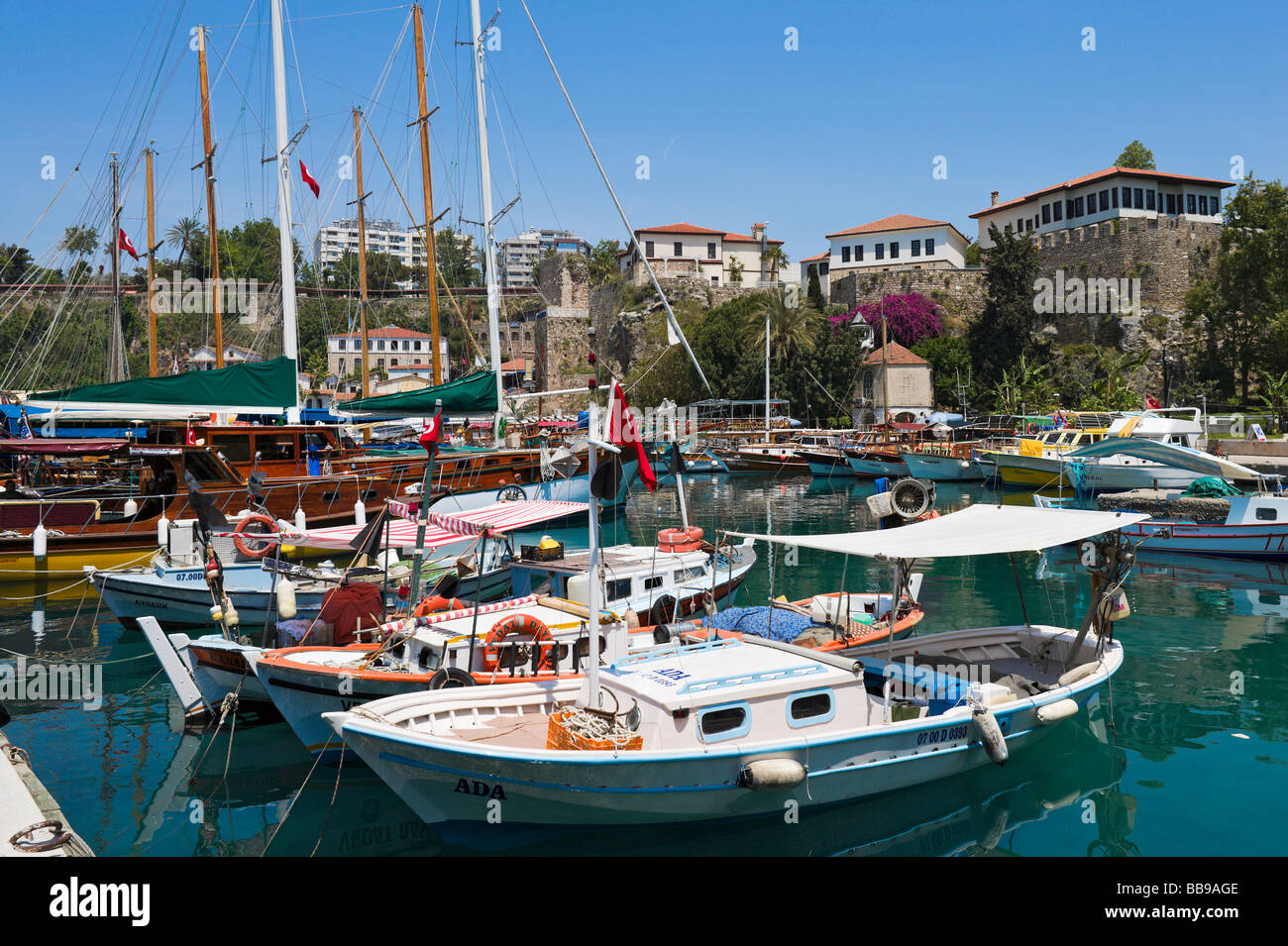 Local fishing boats in the harbour in Kaleici (the Old Town), Antalya, Mediterranean Coast, Turkey Stock Photo