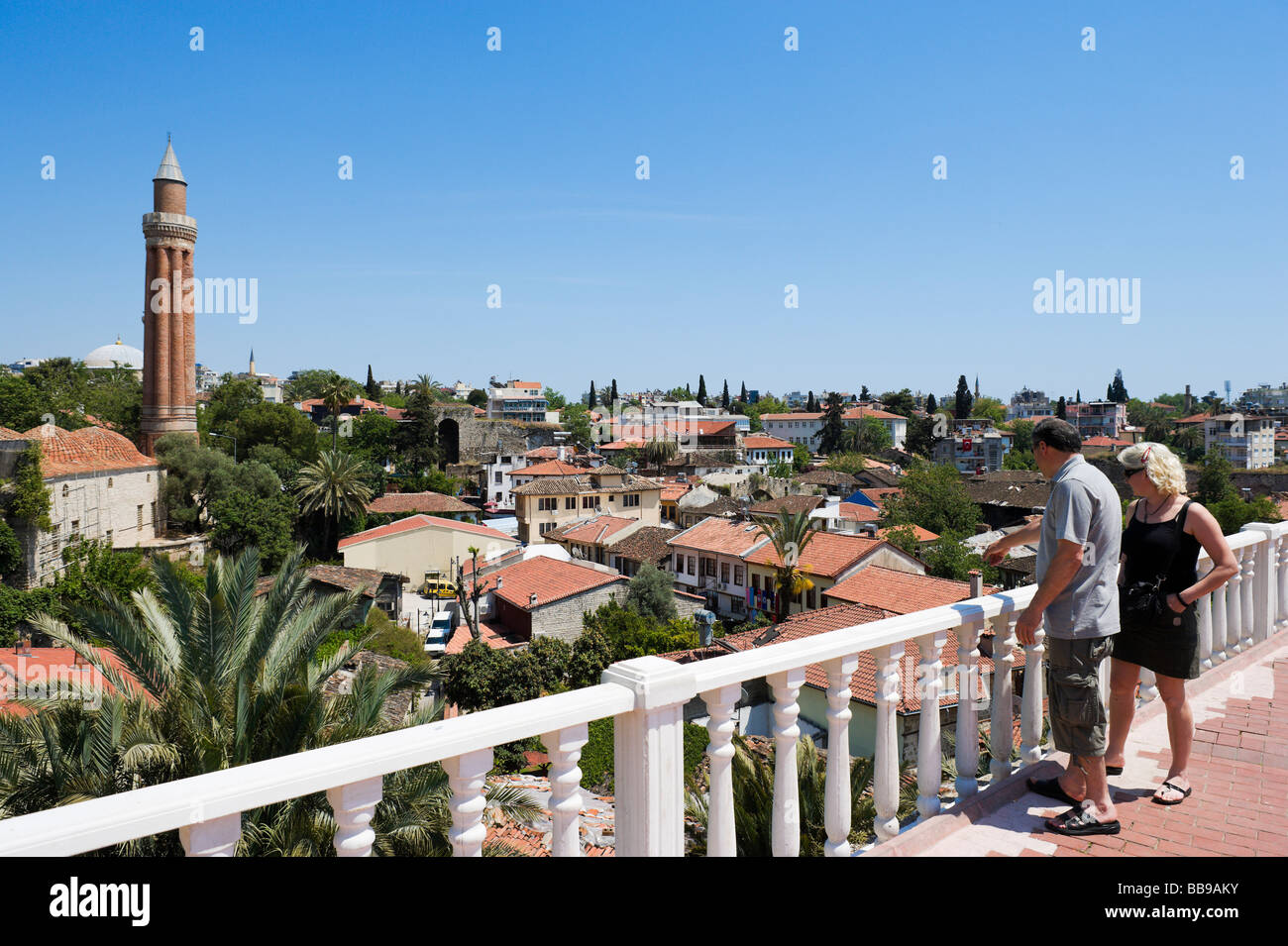 View of the Yivli Minare (Fluted Minaret) above the roofs of Kaleici (the OldTown), Antalya, Mediterranean Coast, Turkey Stock Photo