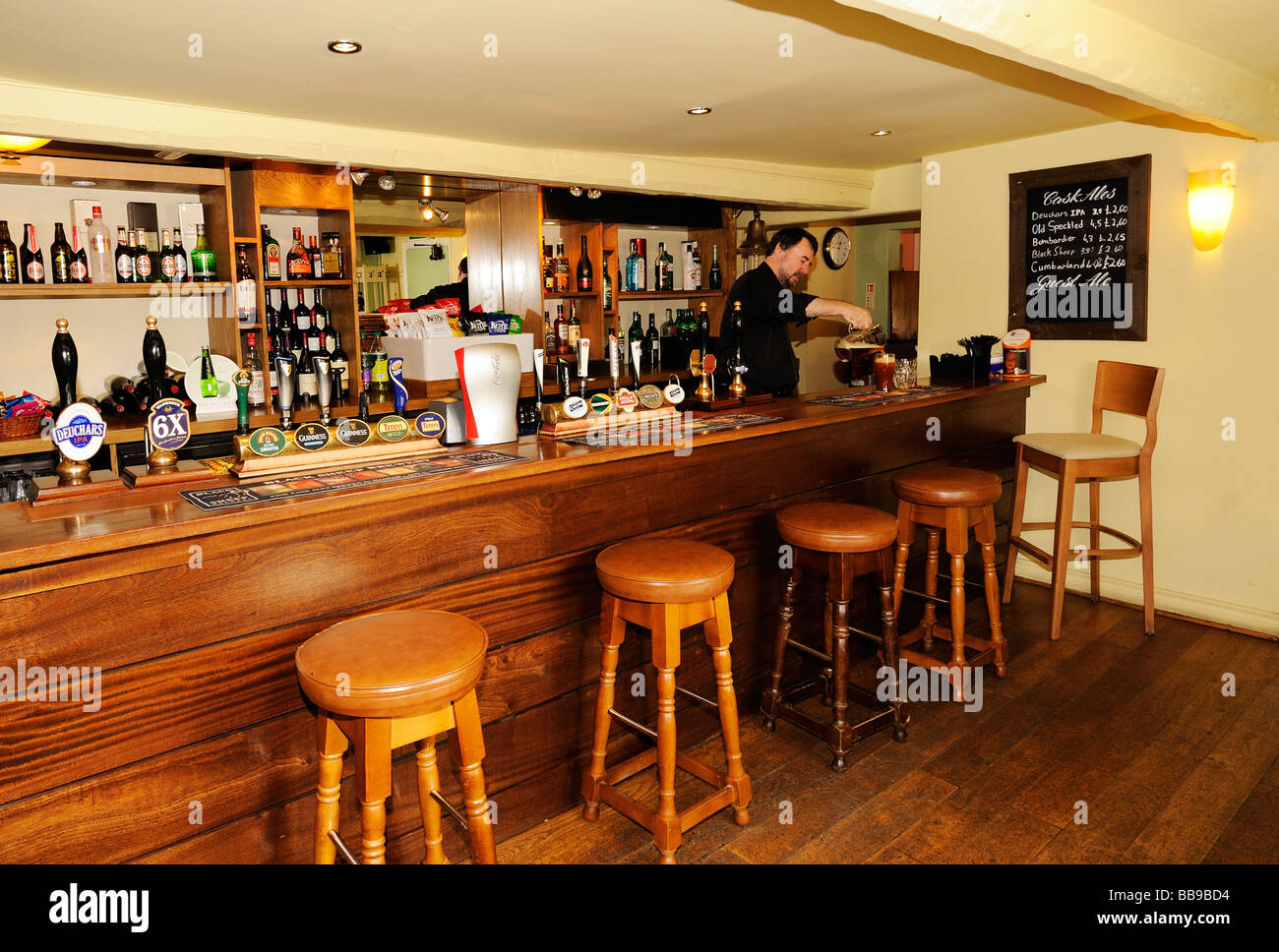 The landlord of the Golden Lion Public house in Ashton Hayes Britains